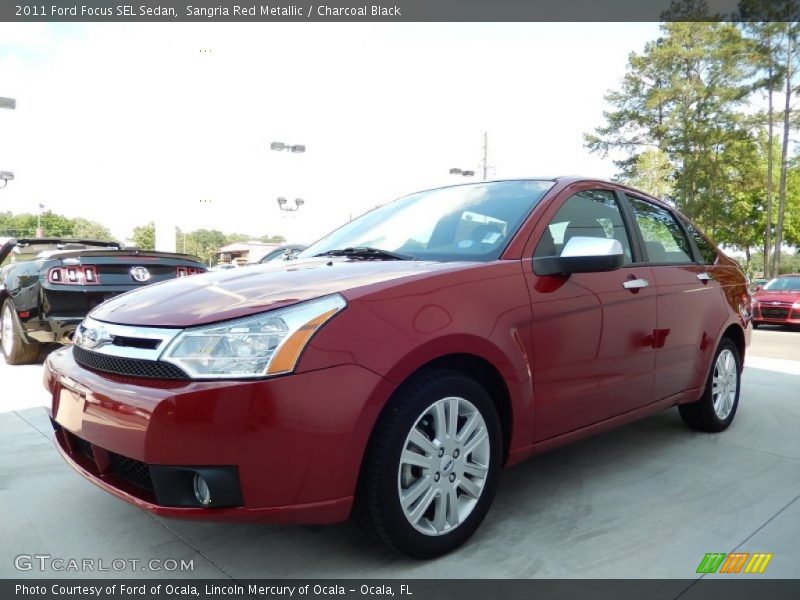 Sangria Red Metallic / Charcoal Black 2011 Ford Focus SEL Sedan