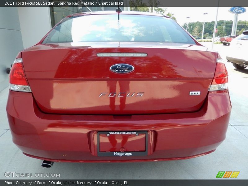 Sangria Red Metallic / Charcoal Black 2011 Ford Focus SEL Sedan
