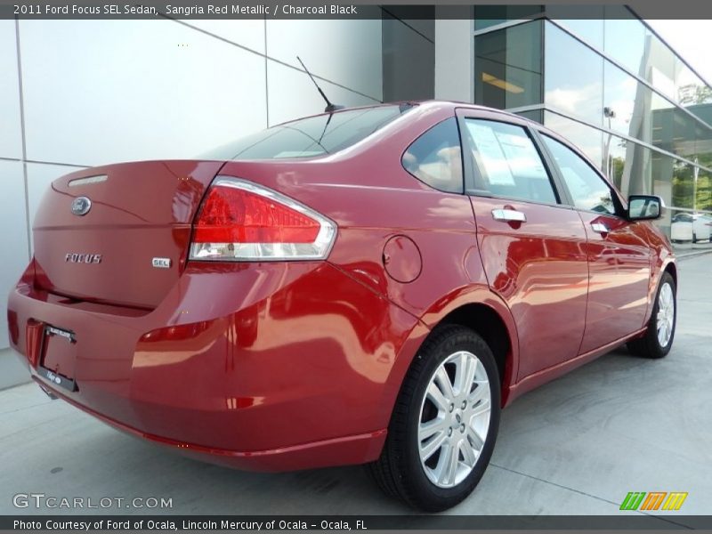 Sangria Red Metallic / Charcoal Black 2011 Ford Focus SEL Sedan