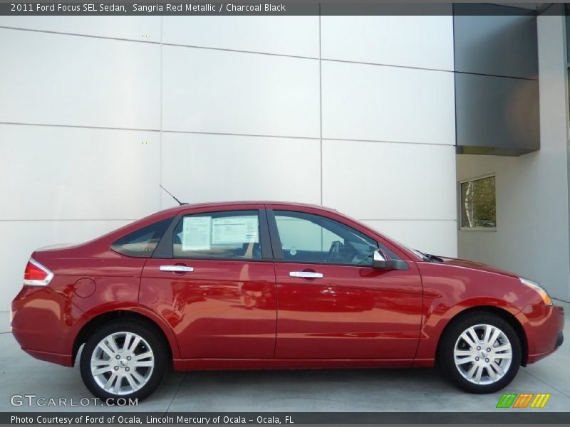 Sangria Red Metallic / Charcoal Black 2011 Ford Focus SEL Sedan