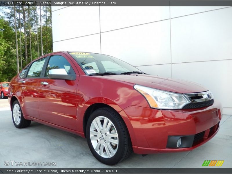 Sangria Red Metallic / Charcoal Black 2011 Ford Focus SEL Sedan