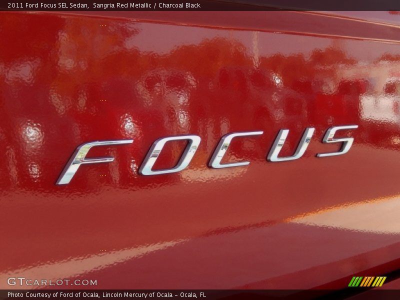 Sangria Red Metallic / Charcoal Black 2011 Ford Focus SEL Sedan