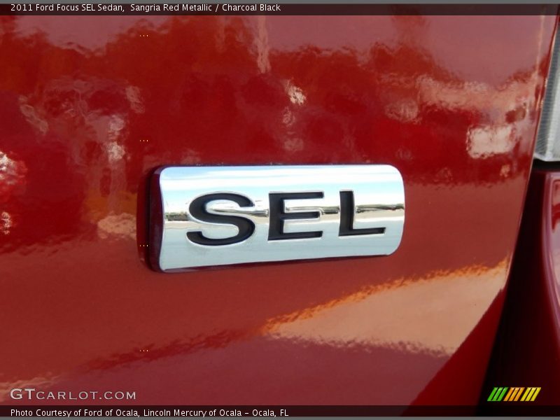 Sangria Red Metallic / Charcoal Black 2011 Ford Focus SEL Sedan