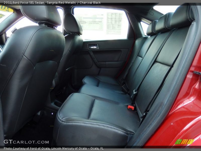 Sangria Red Metallic / Charcoal Black 2011 Ford Focus SEL Sedan