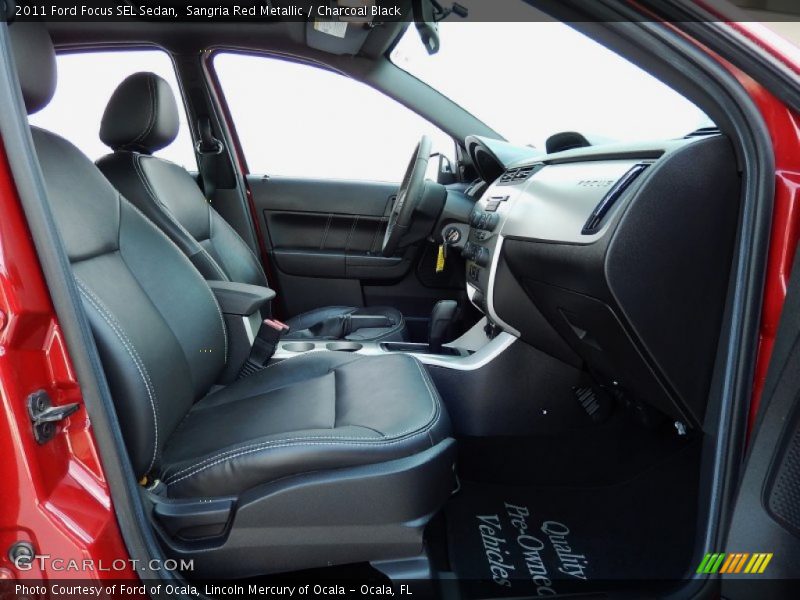Sangria Red Metallic / Charcoal Black 2011 Ford Focus SEL Sedan