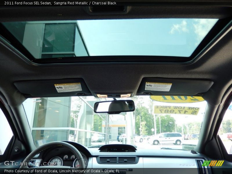 Sangria Red Metallic / Charcoal Black 2011 Ford Focus SEL Sedan