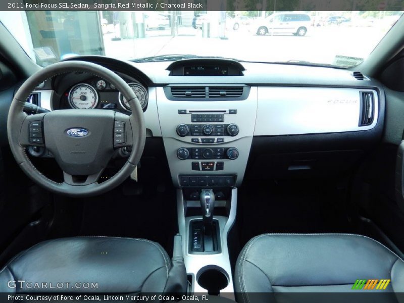 Sangria Red Metallic / Charcoal Black 2011 Ford Focus SEL Sedan
