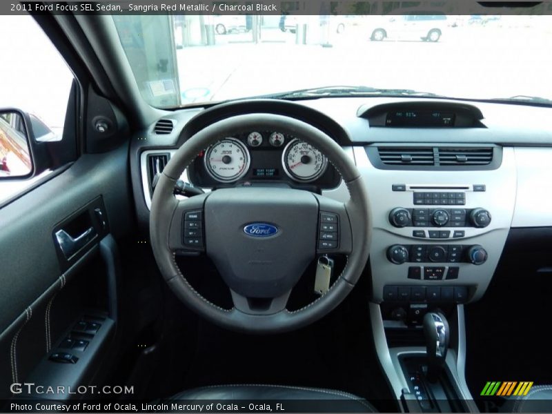 Sangria Red Metallic / Charcoal Black 2011 Ford Focus SEL Sedan