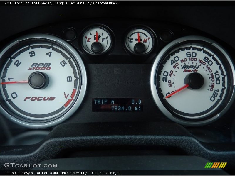 Sangria Red Metallic / Charcoal Black 2011 Ford Focus SEL Sedan