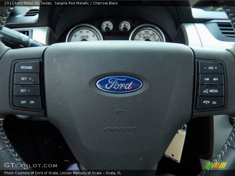 Sangria Red Metallic / Charcoal Black 2011 Ford Focus SEL Sedan