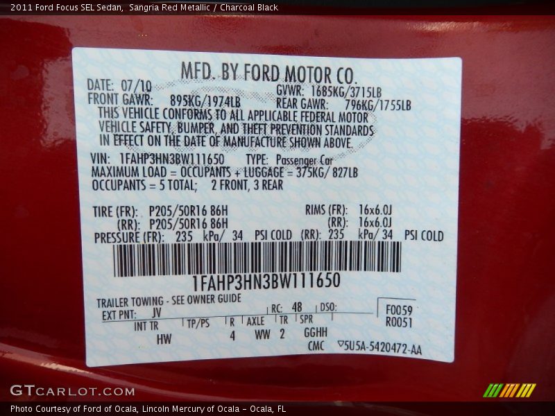 Sangria Red Metallic / Charcoal Black 2011 Ford Focus SEL Sedan