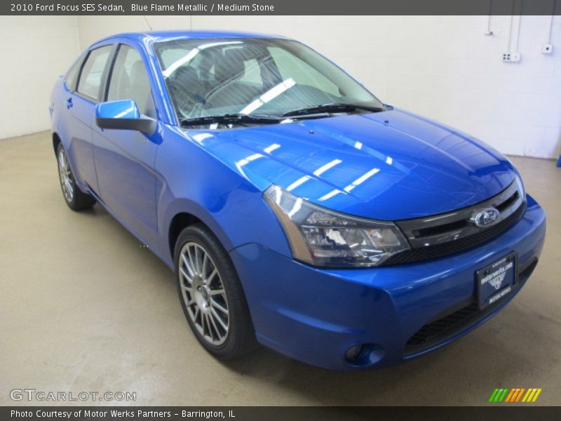Blue Flame Metallic / Medium Stone 2010 Ford Focus SES Sedan