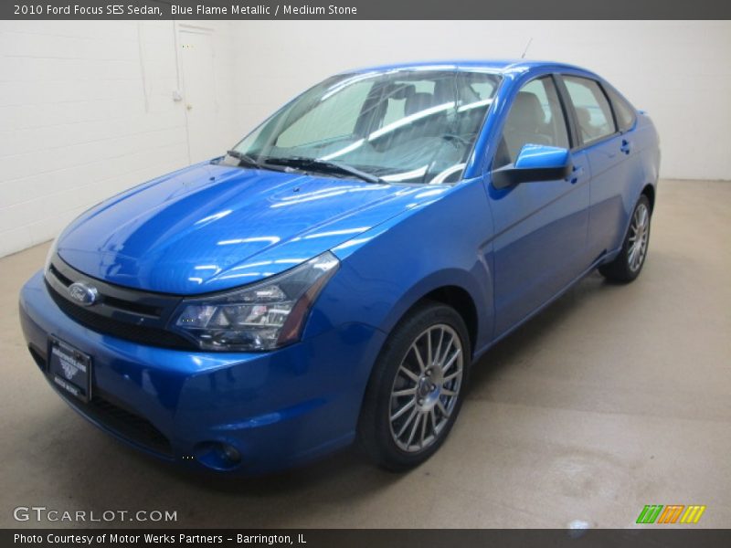 Blue Flame Metallic / Medium Stone 2010 Ford Focus SES Sedan