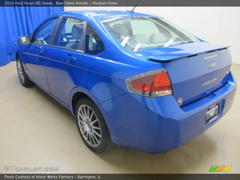Blue Flame Metallic / Medium Stone 2010 Ford Focus SES Sedan