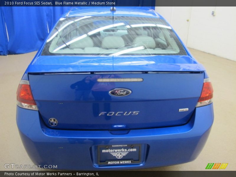 Blue Flame Metallic / Medium Stone 2010 Ford Focus SES Sedan