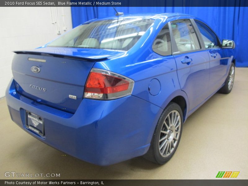 Blue Flame Metallic / Medium Stone 2010 Ford Focus SES Sedan