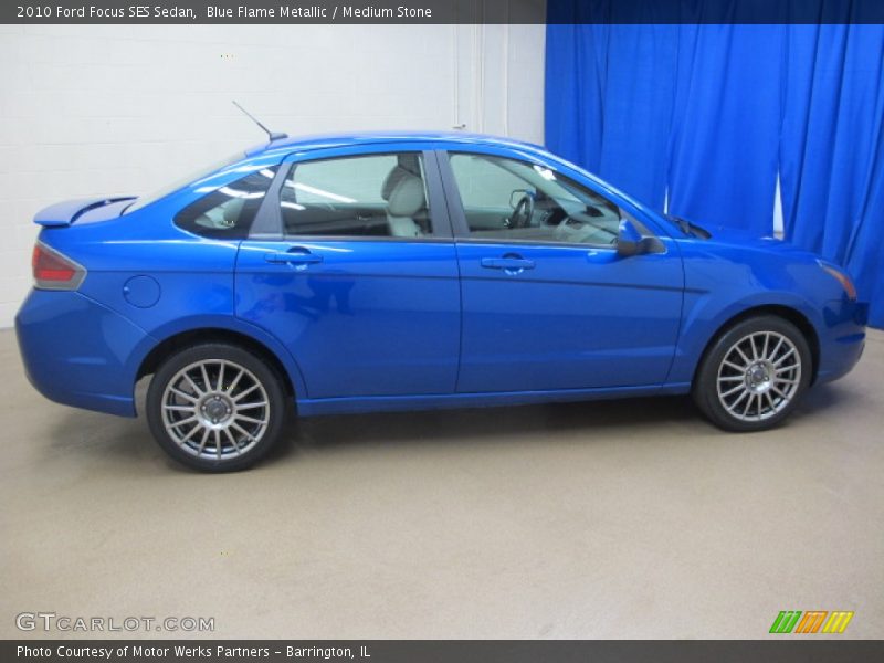 Blue Flame Metallic / Medium Stone 2010 Ford Focus SES Sedan