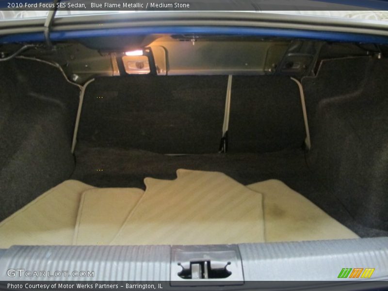 Blue Flame Metallic / Medium Stone 2010 Ford Focus SES Sedan