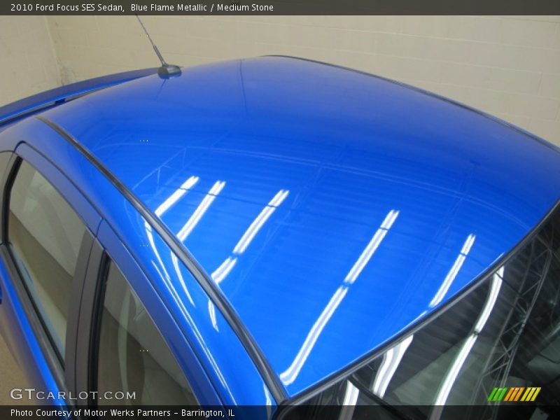 Blue Flame Metallic / Medium Stone 2010 Ford Focus SES Sedan