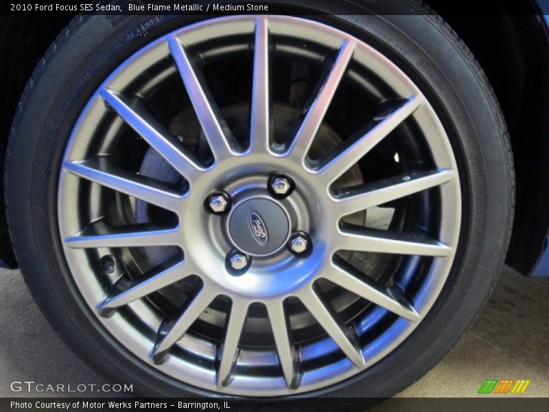 Blue Flame Metallic / Medium Stone 2010 Ford Focus SES Sedan