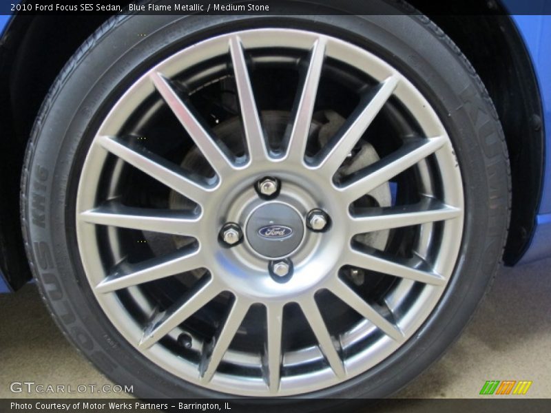 Blue Flame Metallic / Medium Stone 2010 Ford Focus SES Sedan