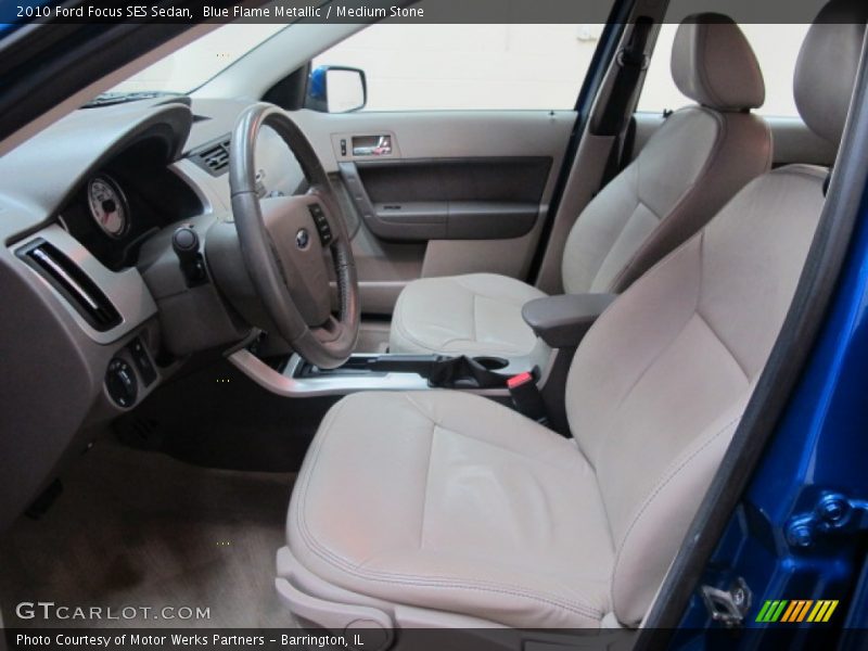 Blue Flame Metallic / Medium Stone 2010 Ford Focus SES Sedan