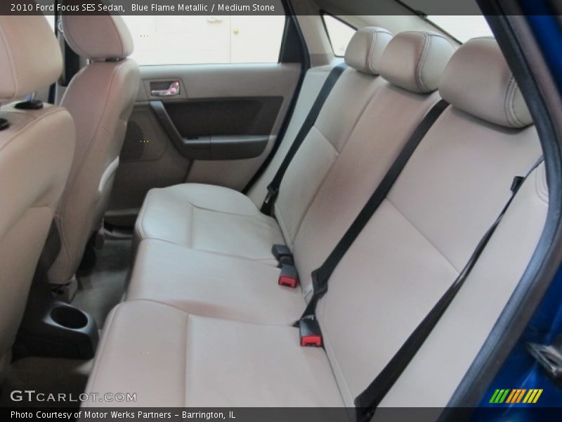 Blue Flame Metallic / Medium Stone 2010 Ford Focus SES Sedan