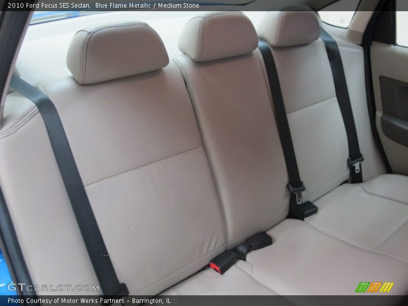 Blue Flame Metallic / Medium Stone 2010 Ford Focus SES Sedan