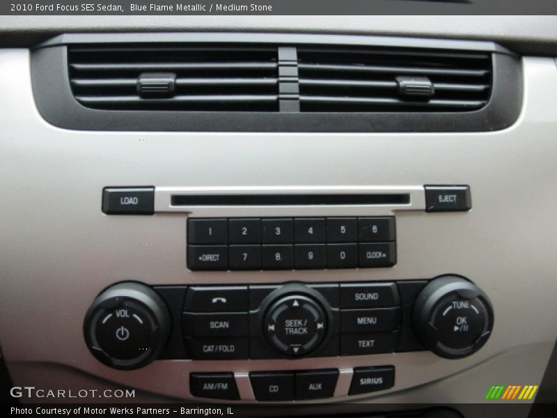 Blue Flame Metallic / Medium Stone 2010 Ford Focus SES Sedan