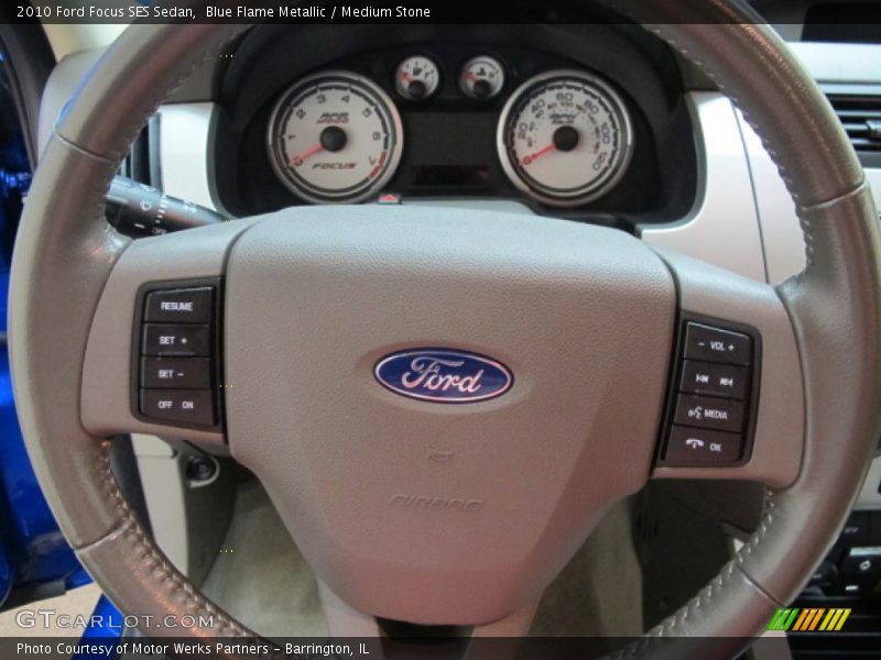 Blue Flame Metallic / Medium Stone 2010 Ford Focus SES Sedan
