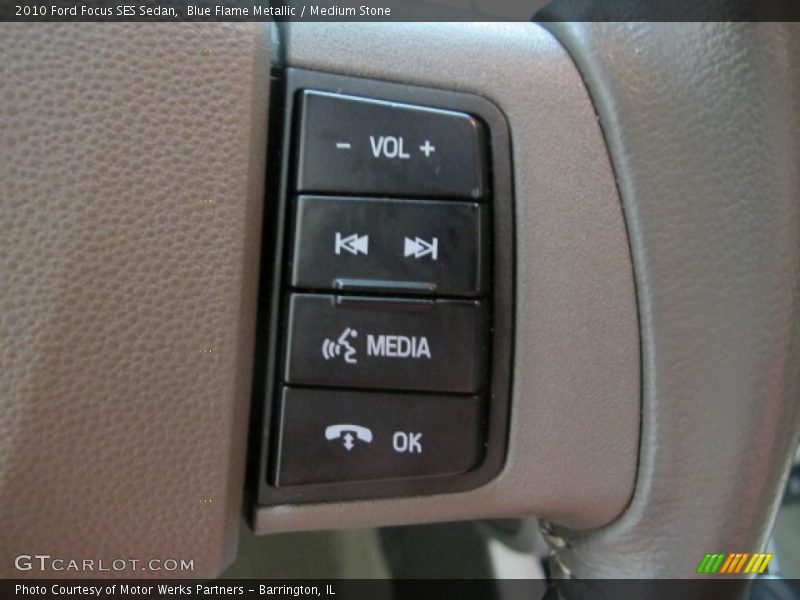Blue Flame Metallic / Medium Stone 2010 Ford Focus SES Sedan