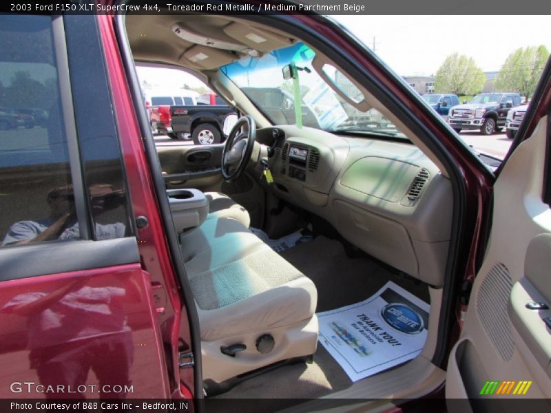 Toreador Red Metallic / Medium Parchment Beige 2003 Ford F150 XLT SuperCrew 4x4
