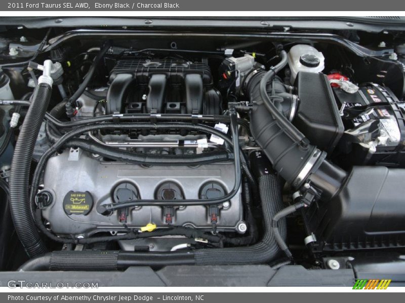 Ebony Black / Charcoal Black 2011 Ford Taurus SEL AWD