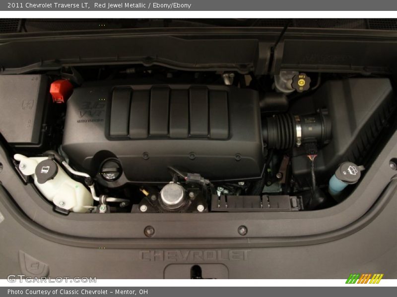 Red Jewel Metallic / Ebony/Ebony 2011 Chevrolet Traverse LT