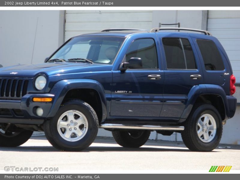 Patriot Blue Pearlcoat / Taupe 2002 Jeep Liberty Limited 4x4