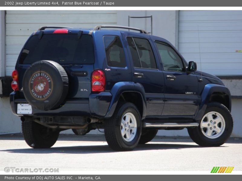 Patriot Blue Pearlcoat / Taupe 2002 Jeep Liberty Limited 4x4