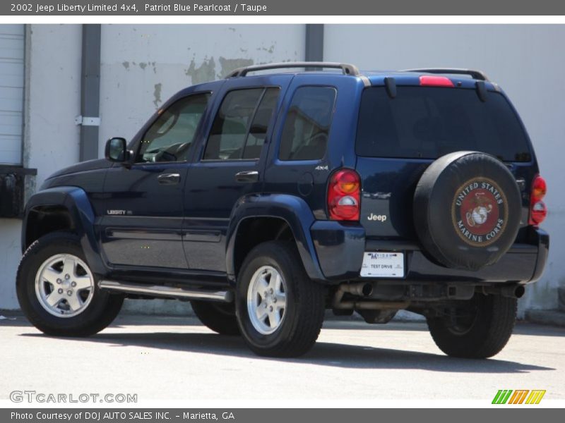 Patriot Blue Pearlcoat / Taupe 2002 Jeep Liberty Limited 4x4
