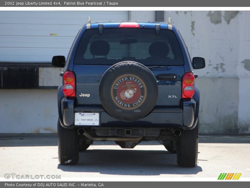 Patriot Blue Pearlcoat / Taupe 2002 Jeep Liberty Limited 4x4