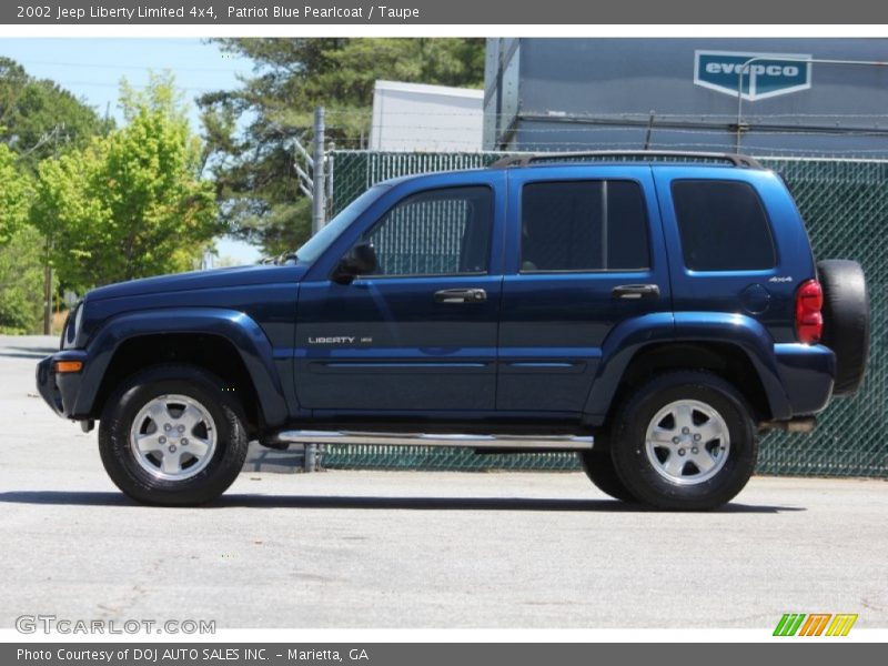 Patriot Blue Pearlcoat / Taupe 2002 Jeep Liberty Limited 4x4