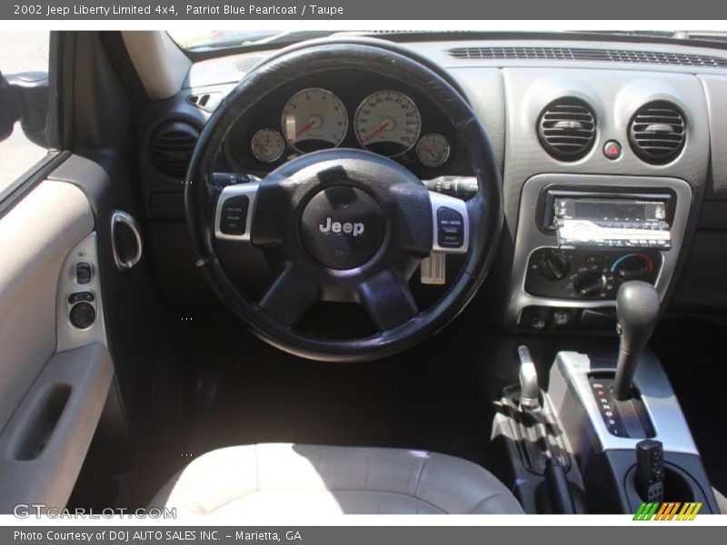 Patriot Blue Pearlcoat / Taupe 2002 Jeep Liberty Limited 4x4