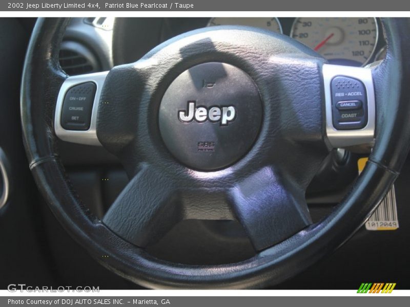 Patriot Blue Pearlcoat / Taupe 2002 Jeep Liberty Limited 4x4