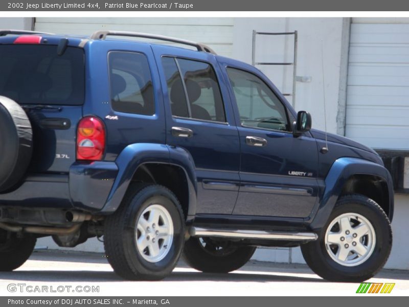 Patriot Blue Pearlcoat / Taupe 2002 Jeep Liberty Limited 4x4