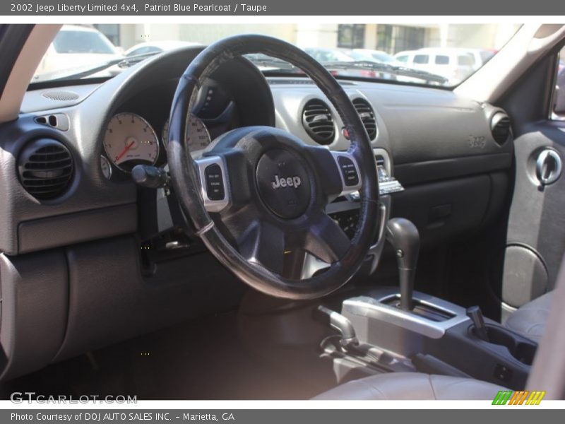 Patriot Blue Pearlcoat / Taupe 2002 Jeep Liberty Limited 4x4