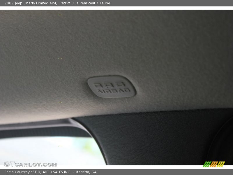Patriot Blue Pearlcoat / Taupe 2002 Jeep Liberty Limited 4x4