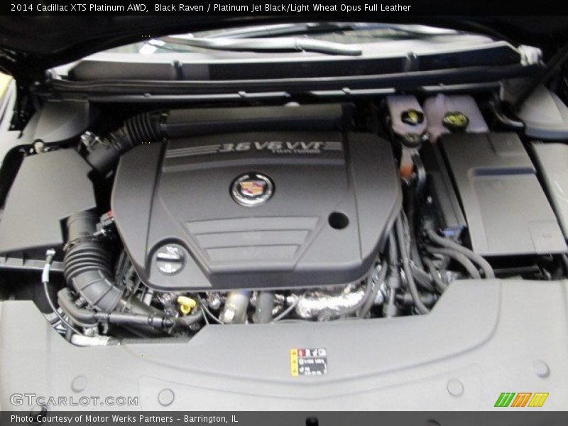 Black Raven / Platinum Jet Black/Light Wheat Opus Full Leather 2014 Cadillac XTS Platinum AWD