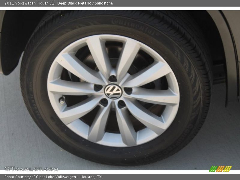 Deep Black Metallic / Sandstone 2011 Volkswagen Tiguan SE