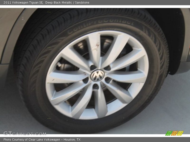 Deep Black Metallic / Sandstone 2011 Volkswagen Tiguan SE