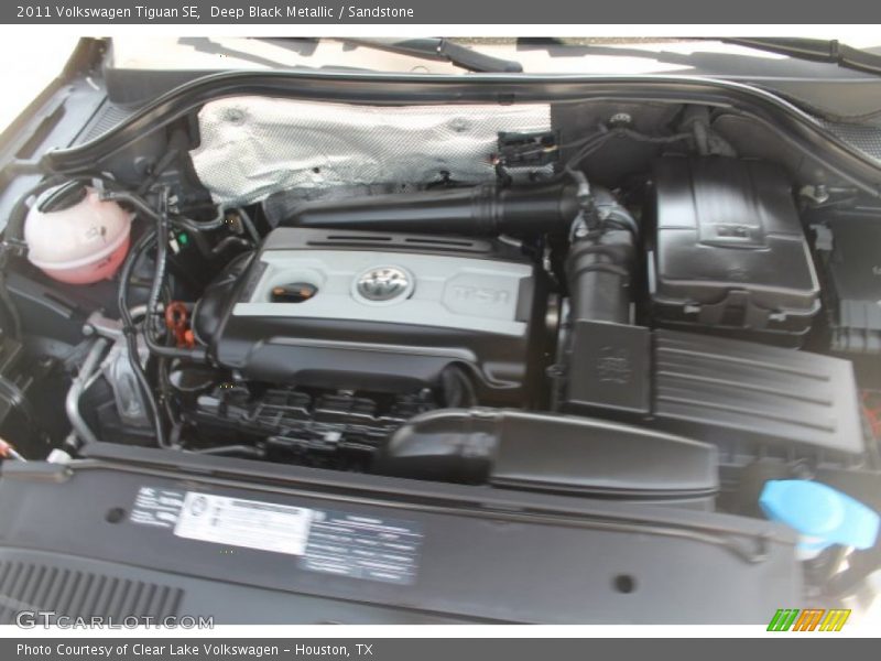 Deep Black Metallic / Sandstone 2011 Volkswagen Tiguan SE