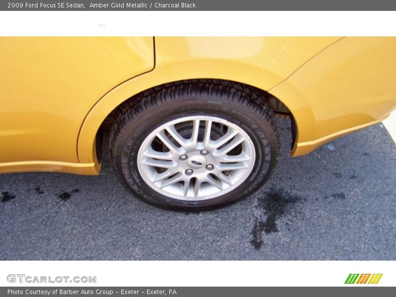 Amber Gold Metallic / Charcoal Black 2009 Ford Focus SE Sedan