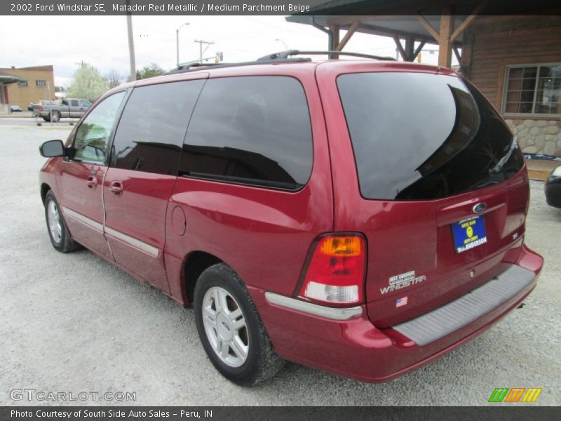 Matador Red Metallic / Medium Parchment Beige 2002 Ford Windstar SE